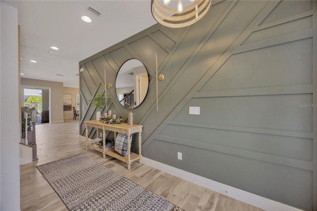 foyer entrance featuring light hardwood / wood-style flooring