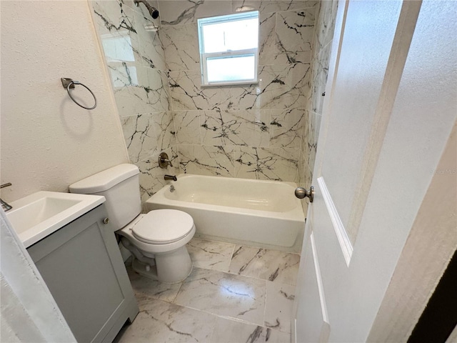 full bathroom with tiled shower / bath combo, vanity, and toilet