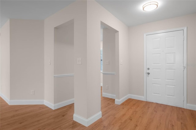 foyer with light hardwood / wood-style flooring