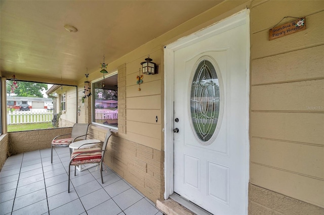 property entrance with a porch