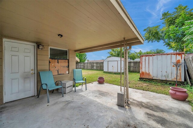 view of patio / terrace featuring a shed