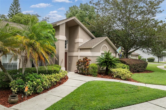 view of front of home featuring a front yard