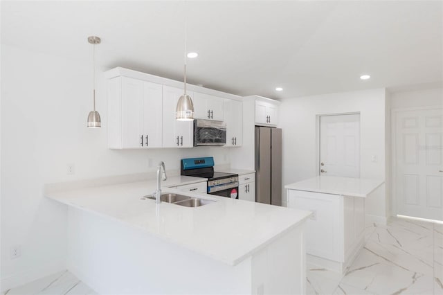 kitchen with appliances with stainless steel finishes, white cabinetry, sink, hanging light fixtures, and kitchen peninsula