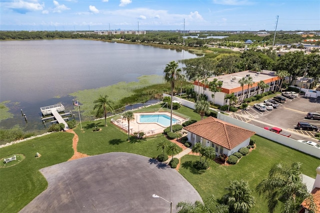 birds eye view of property featuring a water view