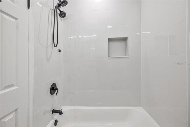 bathroom featuring shower / bath combination