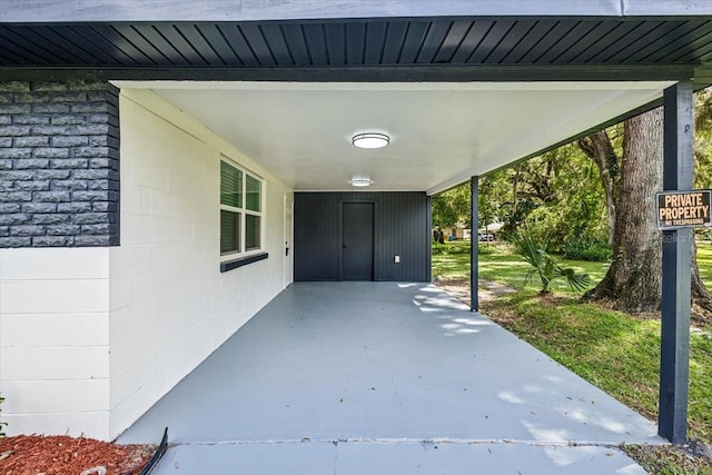 exterior space with a carport