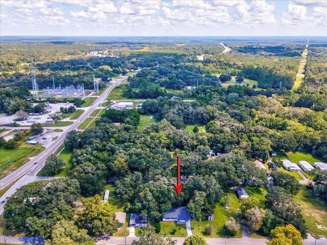 aerial view featuring a forest view