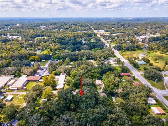 aerial view featuring a forest view