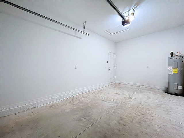 garage featuring electric water heater and a garage door opener