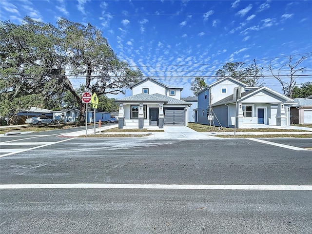 view of front of house featuring covered porch and driveway