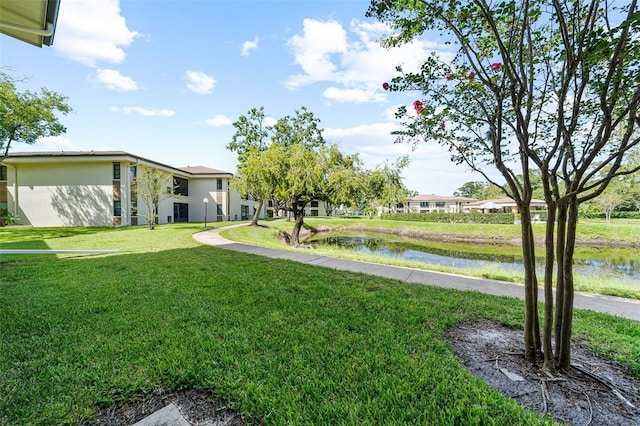 view of yard with a water view