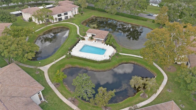 birds eye view of property featuring a water view