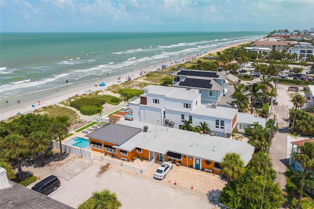 aerial view with a view of the beach and a water view