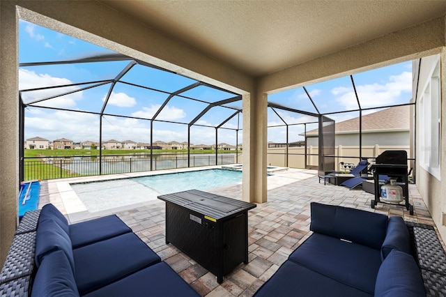 view of swimming pool with a patio, a water view, an outdoor living space, and a lanai