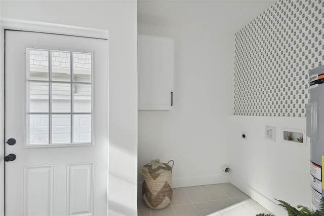 laundry room featuring washer hookup, light tile patterned floors, and electric dryer hookup