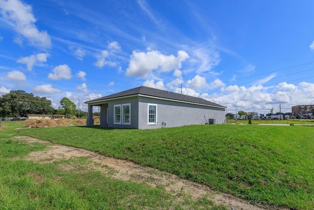 view of property exterior featuring a yard