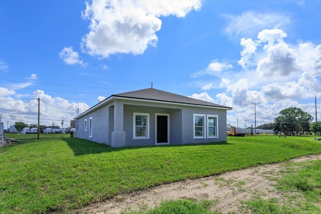 exterior space featuring a lawn