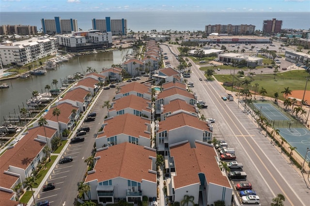 birds eye view of property featuring a water view