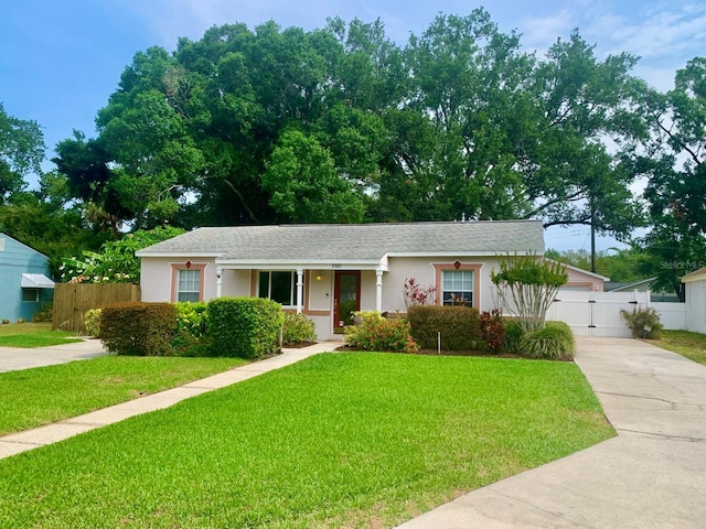 view of front of home with a front lawn