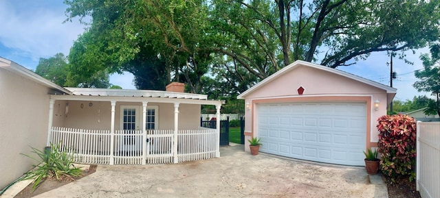 garage with covered porch