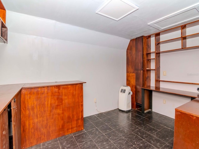 interior space featuring lofted ceiling