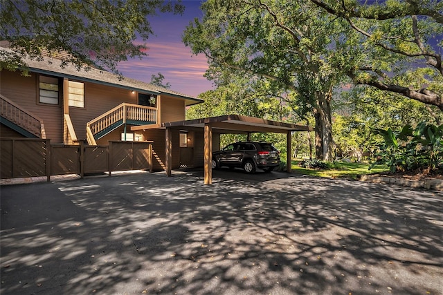 exterior space featuring a carport