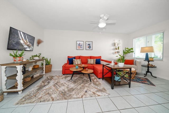 tiled living room featuring ceiling fan