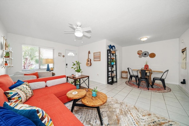 tiled living room featuring ceiling fan