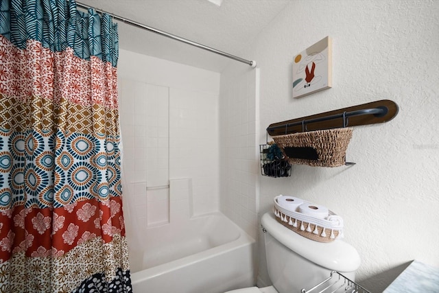 bathroom featuring shower / bath combination with curtain, a textured ceiling, and toilet