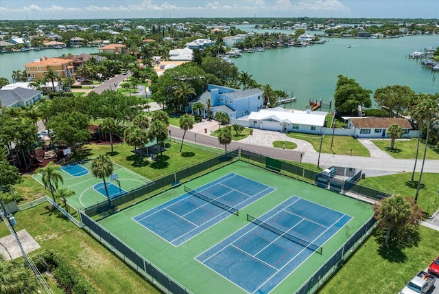 birds eye view of property with a water view