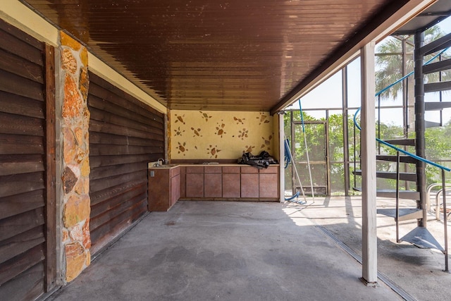 exterior space with wood ceiling