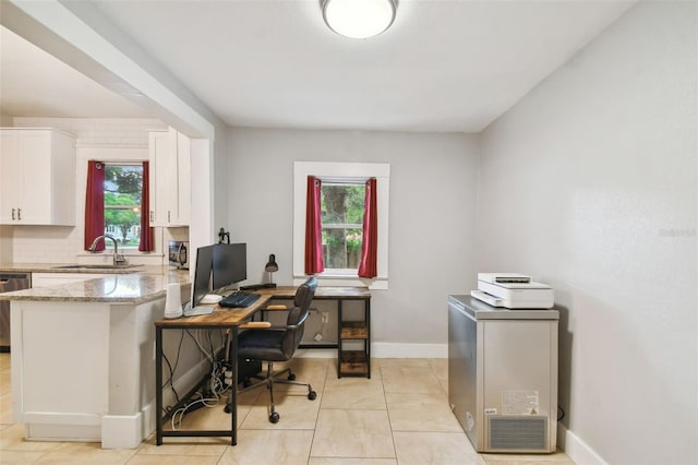 tiled home office with sink