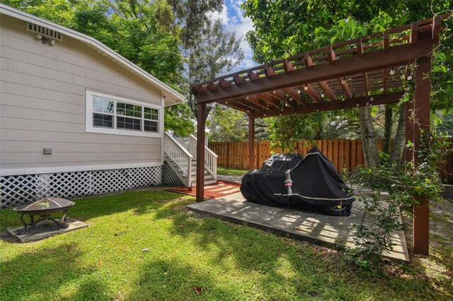 view of yard featuring a pergola and a deck