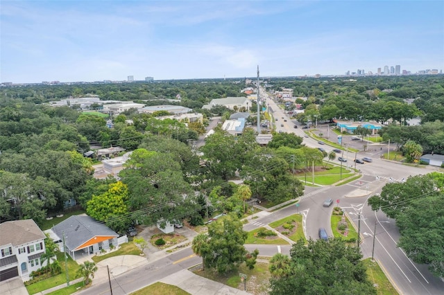 birds eye view of property with a view of city