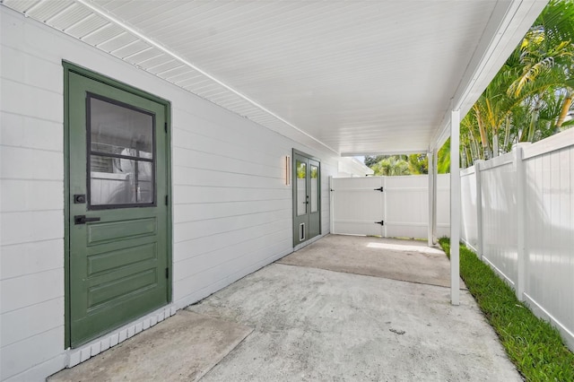 view of patio / terrace with a gate and fence