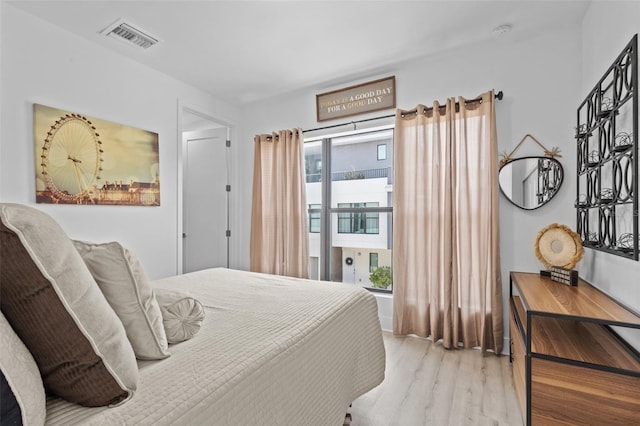 bedroom featuring light hardwood / wood-style flooring