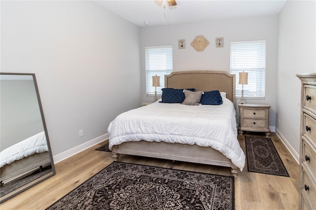 bedroom featuring ceiling fan and light wood-type flooring