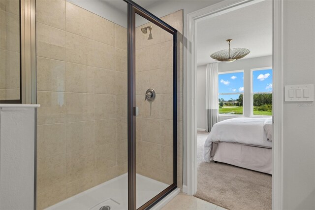 bathroom featuring an enclosed shower