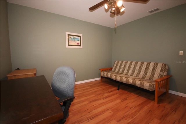 home office featuring ceiling fan and light wood-type flooring