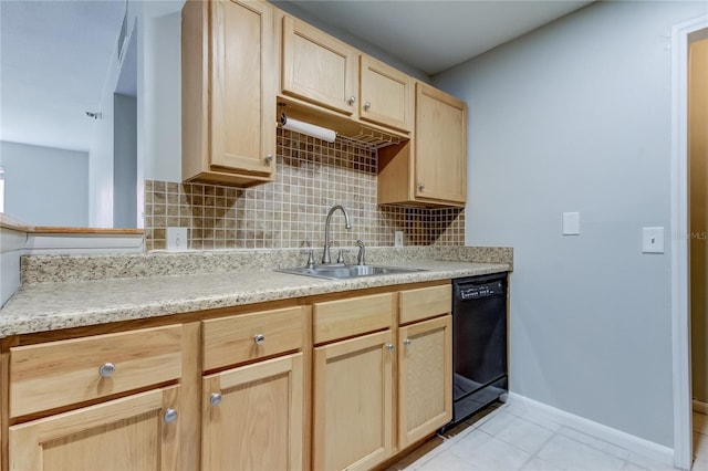 kitchen featuring light brown cabinets, light tile patterned flooring, sink, tasteful backsplash, and black dishwasher