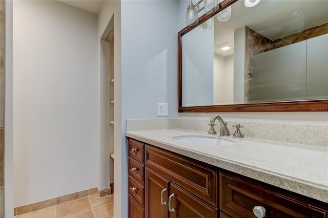 bathroom with vanity and tile patterned floors