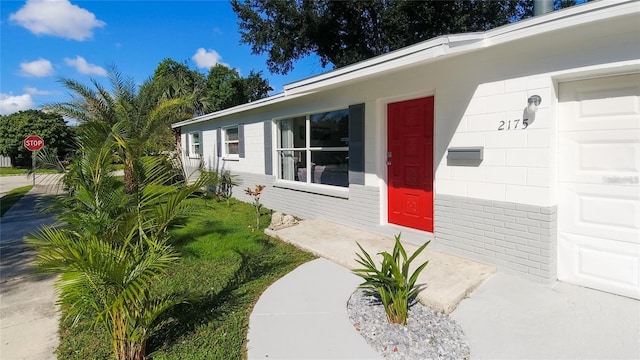 property entrance featuring a garage