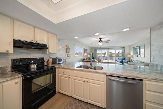 kitchen featuring dishwasher, electric range, sink, kitchen peninsula, and ceiling fan