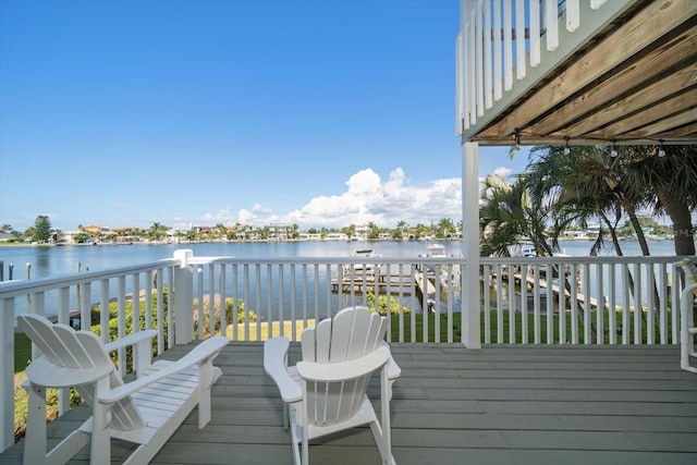 wooden terrace with a water view