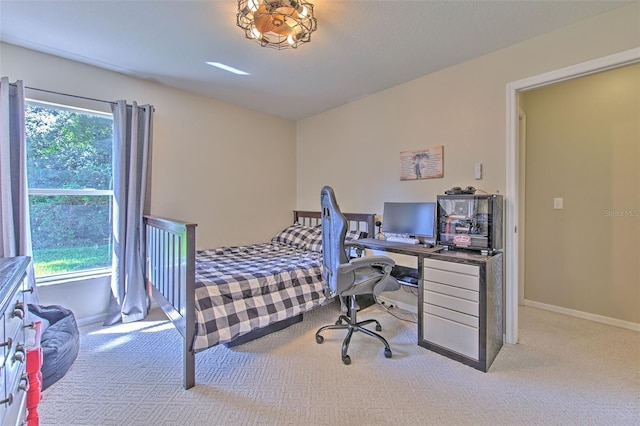 bedroom with light carpet