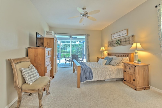 carpeted bedroom with ceiling fan and access to outside