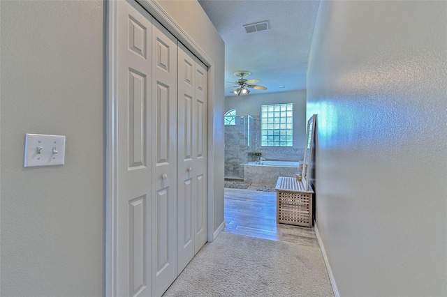 hall featuring light wood-type flooring