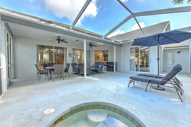 4923 Willow Ridge Ter, Valrico, FL 33596 - exterior space featuring outdoor dining space, a hot tub, french doors, a ceiling fan, and a lanai
