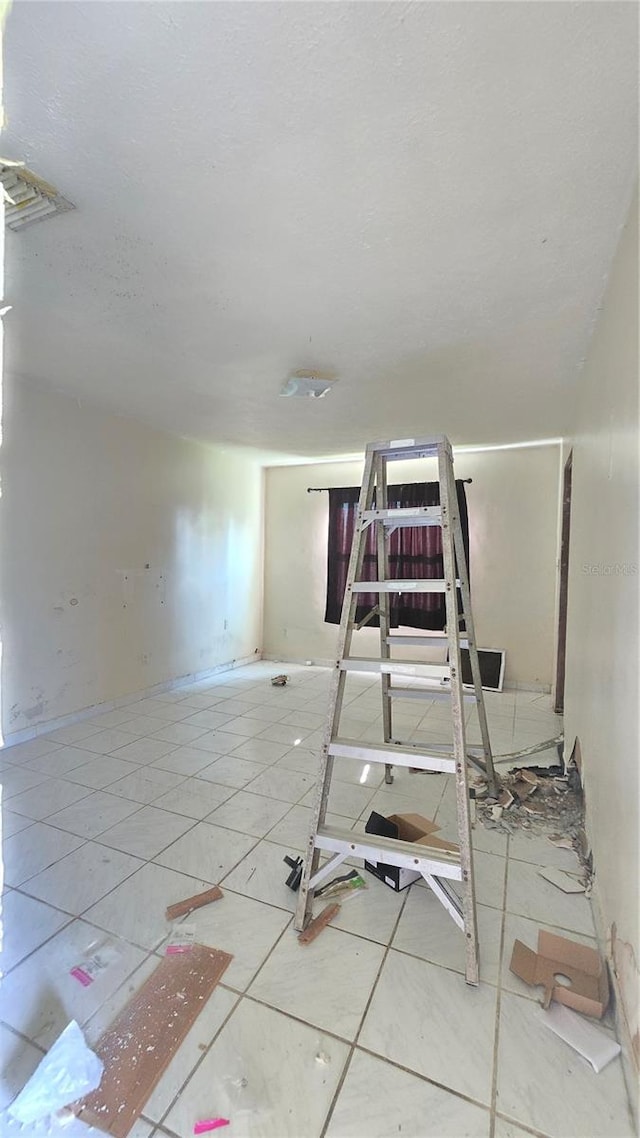 interior space with tile patterned flooring