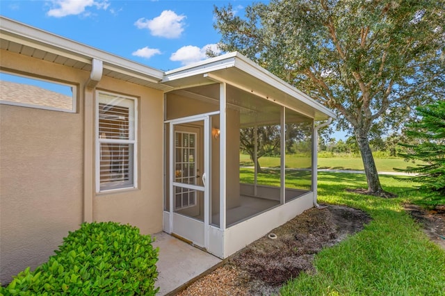 exterior space with a yard